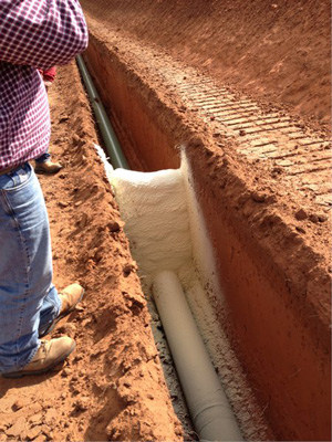 Installing spray foam trench breakers in Amarillo area TX