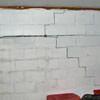 A buckling foundation wall in a Hale Center home.