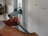 Mounting a foundation wall channel anchor in Hereford.