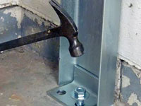 Mounting a foundation channel anchor installation to the floor in Hereford.