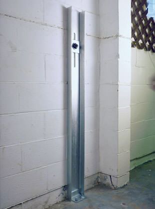 Graphic render of an installed foundation wall anchor system
