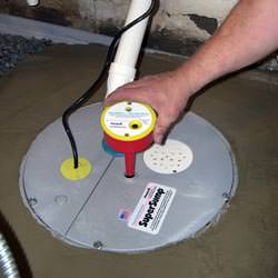 A newly installed sump pump system in a basement in Hale Center
