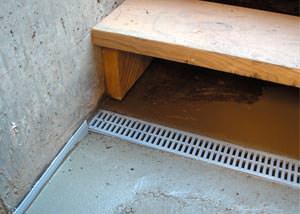 a hatchway entrance in Spearman that has been protected from flooding by our TrenchDrain basement drainage system.