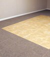 tiled and carpeted basement flooring installed in a Midland home