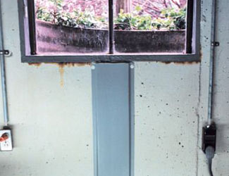 Repaired waterproofed basement window leak in Pampa